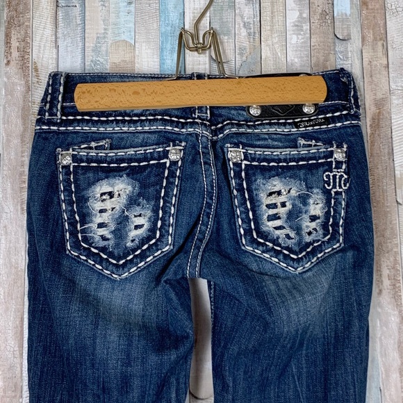 ripped miss me jeans